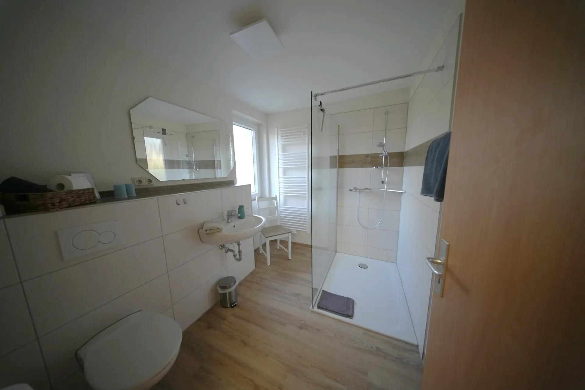 Bright bathroom with walk-in shower